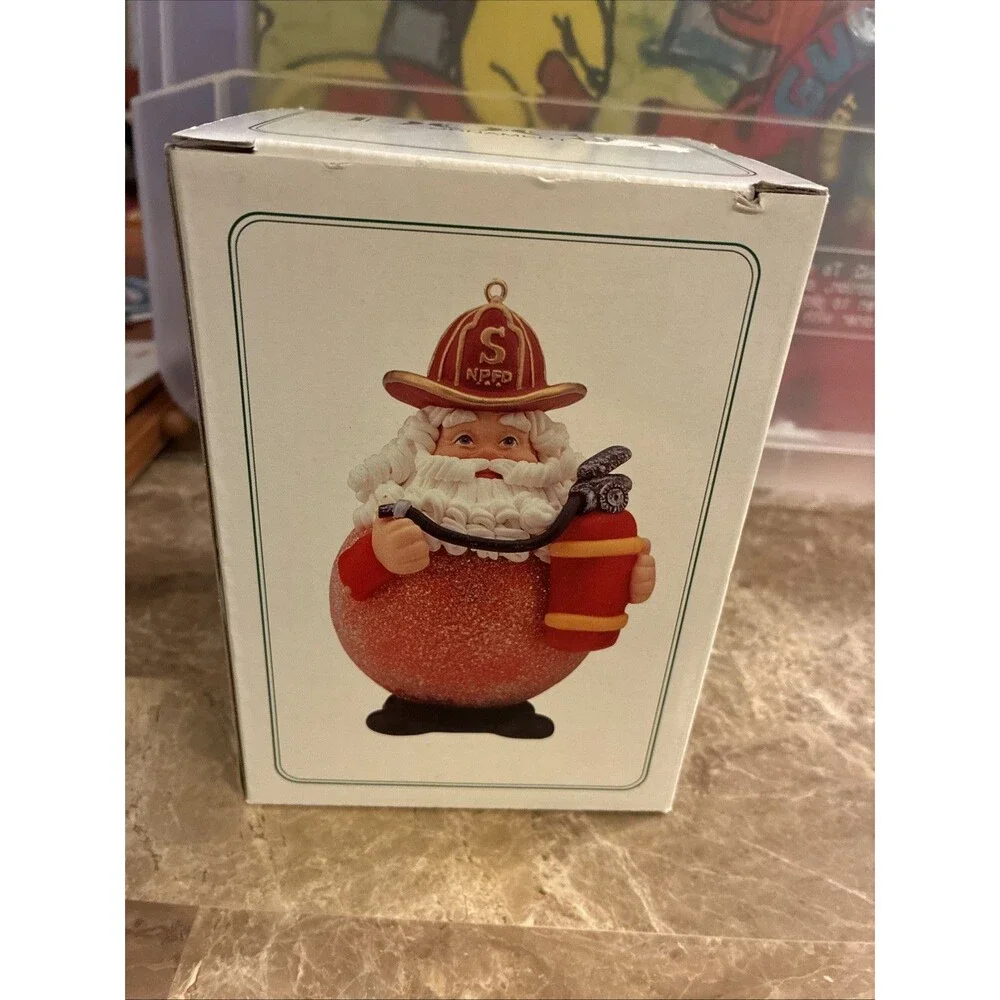 Dept 56 Noel Ornament 6 INCH FIREMAN Santa With Box